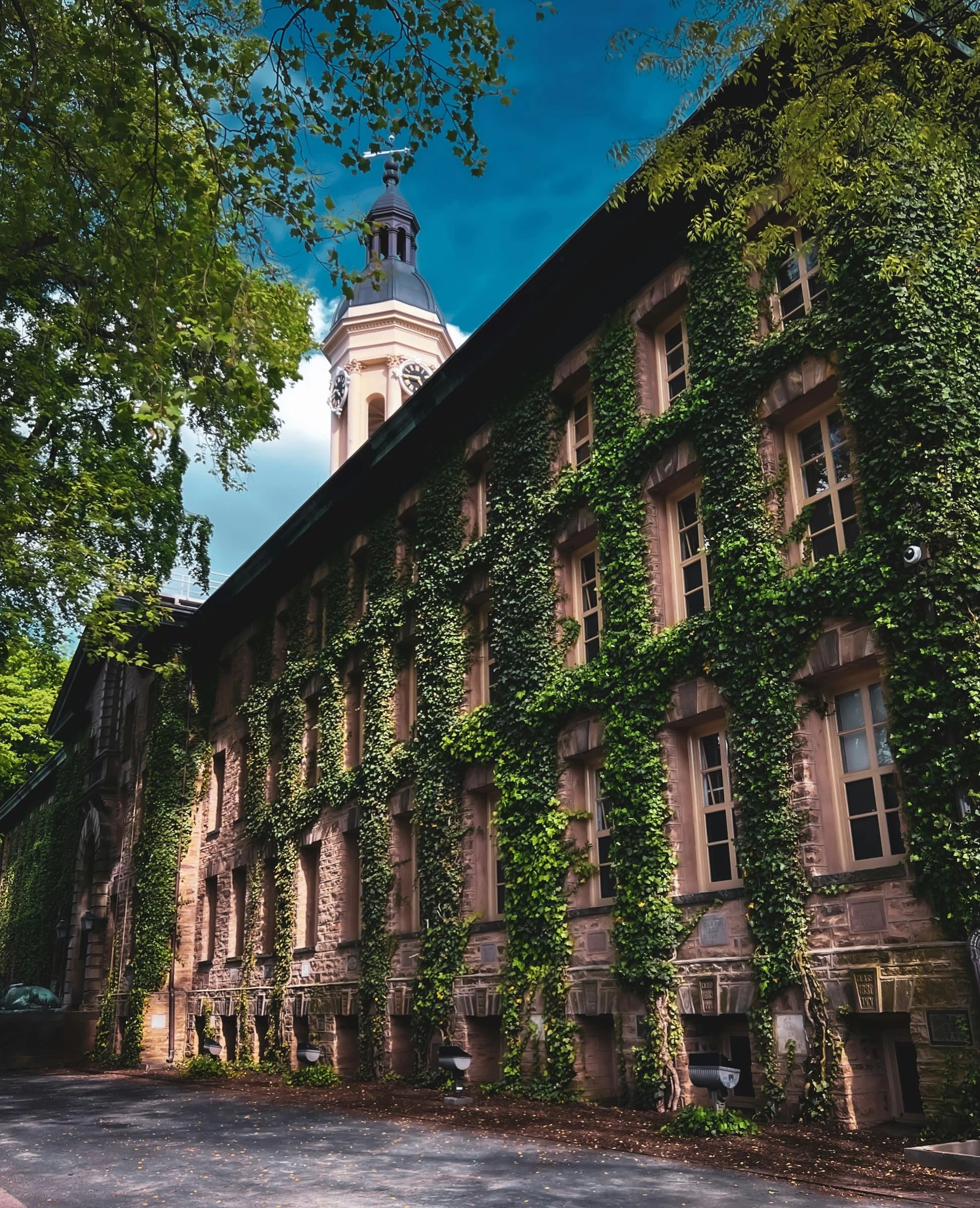 Nassau Hall at Princeton University, ivy climbing the stone under the clock tower